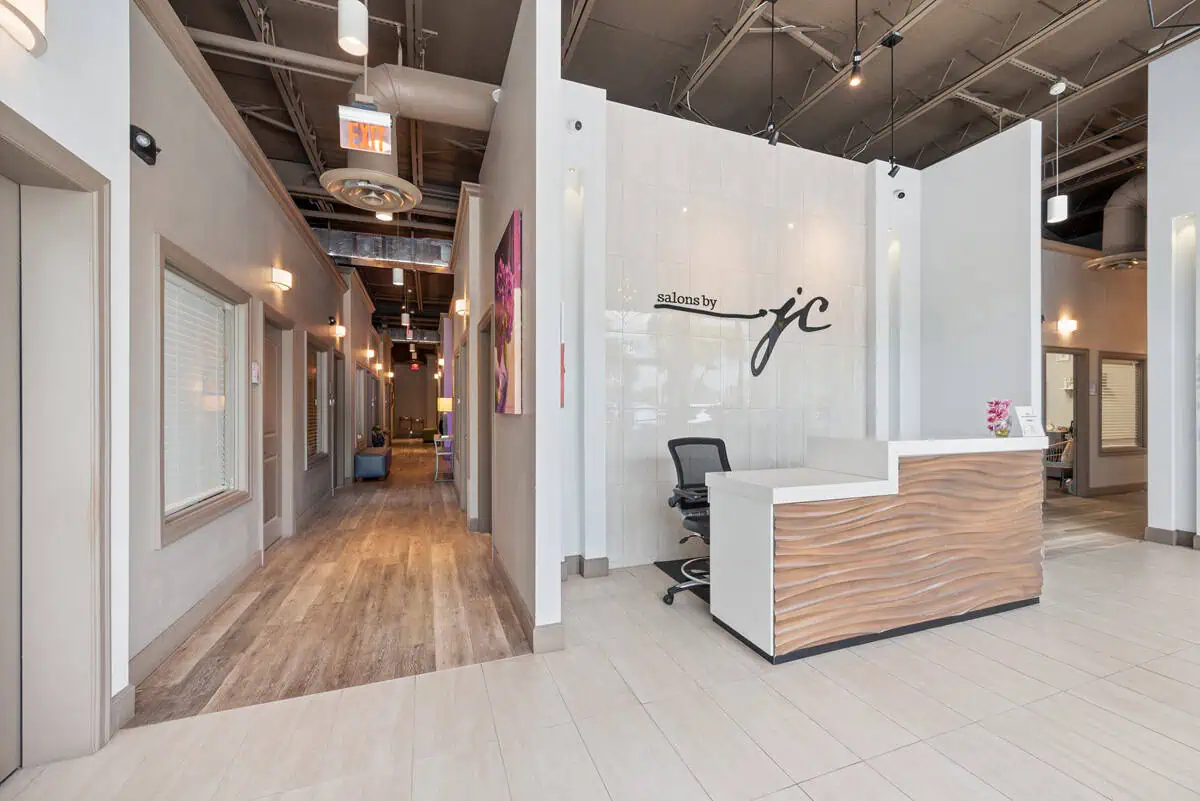 Salon reception and lobby area for 2025 semi-absentee franchise guide.