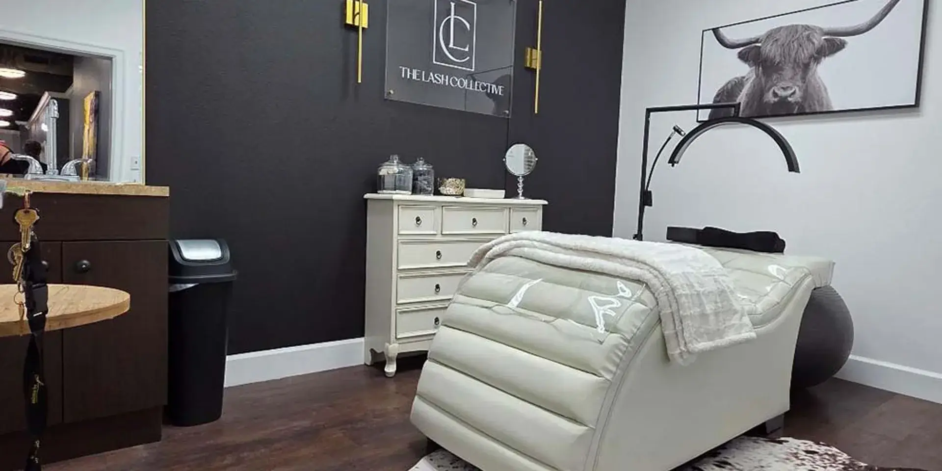Interior of a Salons by JC salon suite with styling chair and mirror for rental property vs franchise investment evaluation